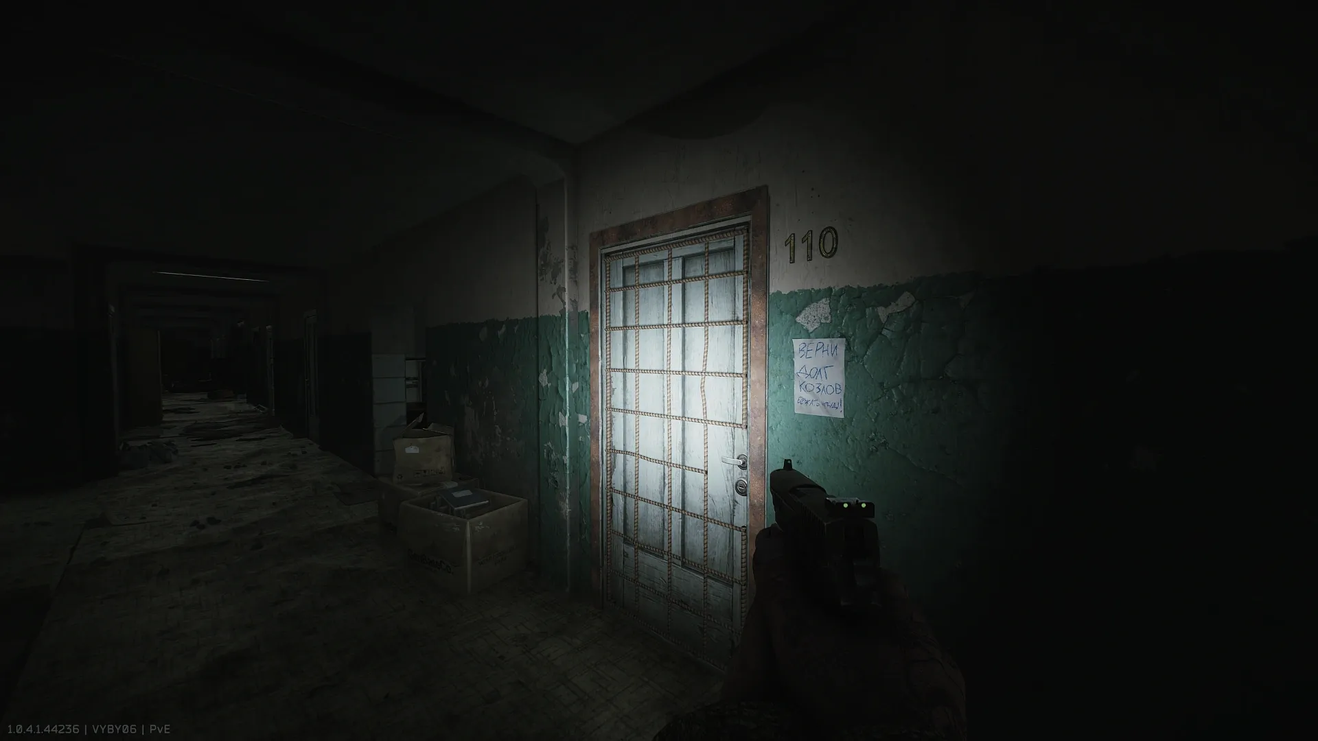 The note on the door is below the room number