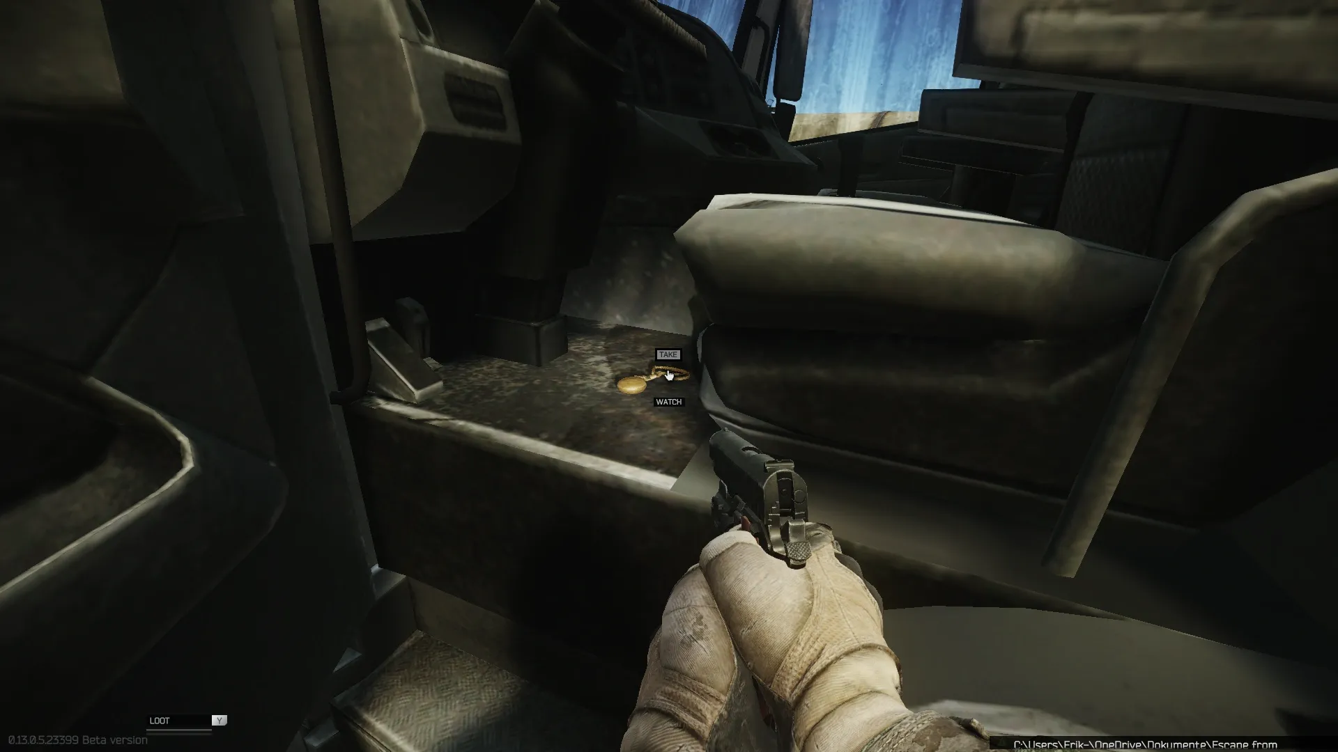 The watch on the floor in front of the seat