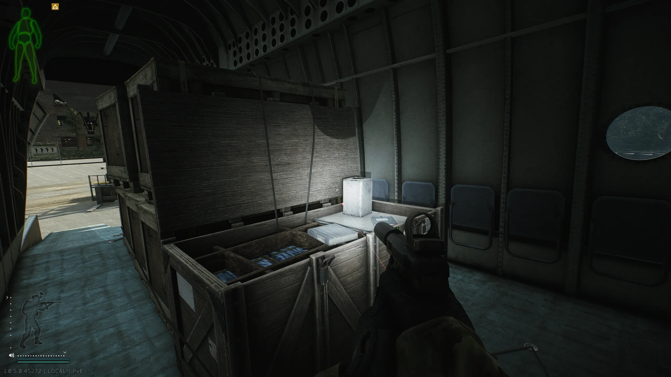 1: On the open wooden crate inside the helicopter