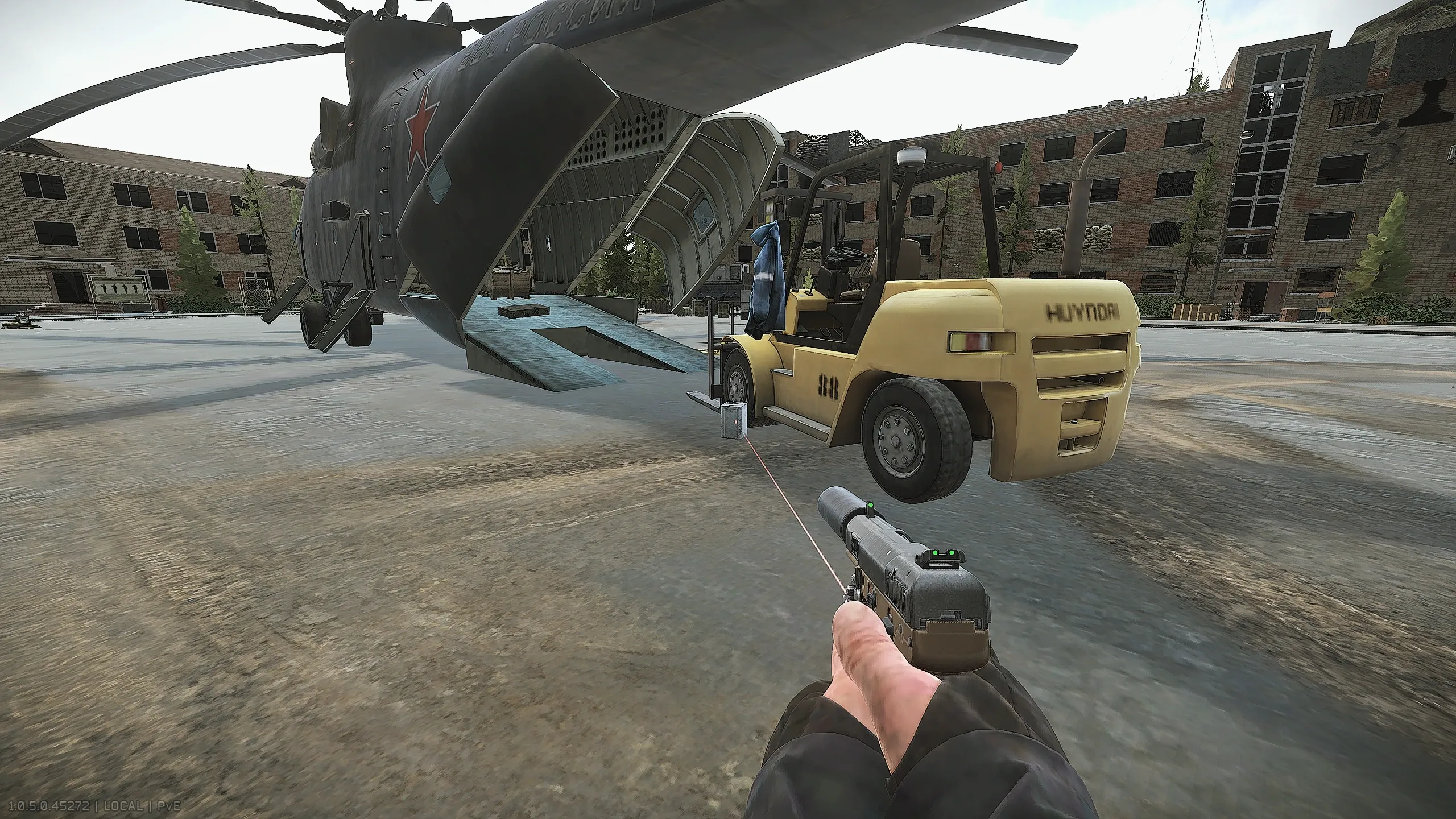 3: Next to the forklift behind the helicopter