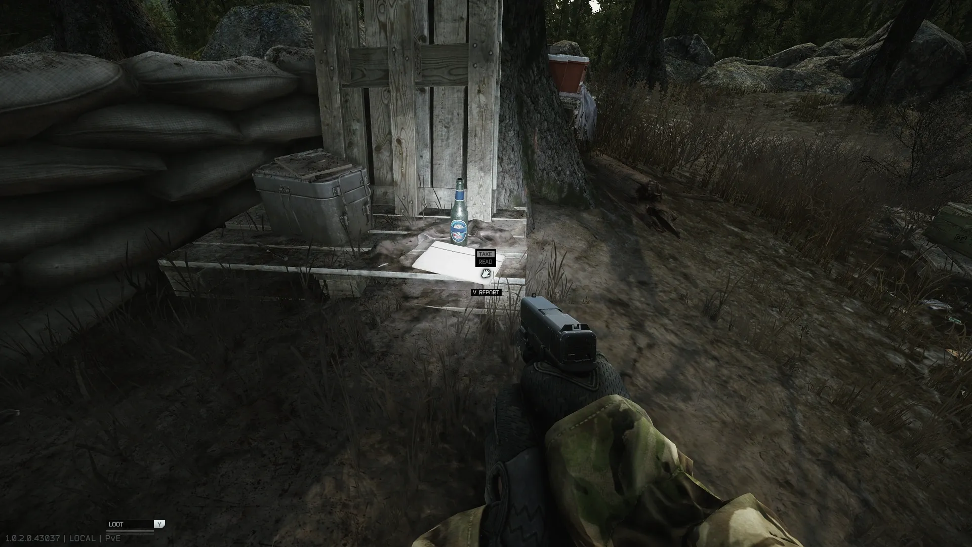 Hostage evacuation report from Voevoda on a pallet next to a bottle in the camp