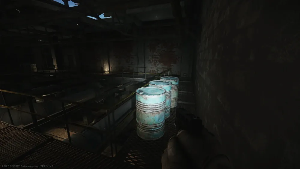 Spot 1: On the third floor in the northern building at blue barrels