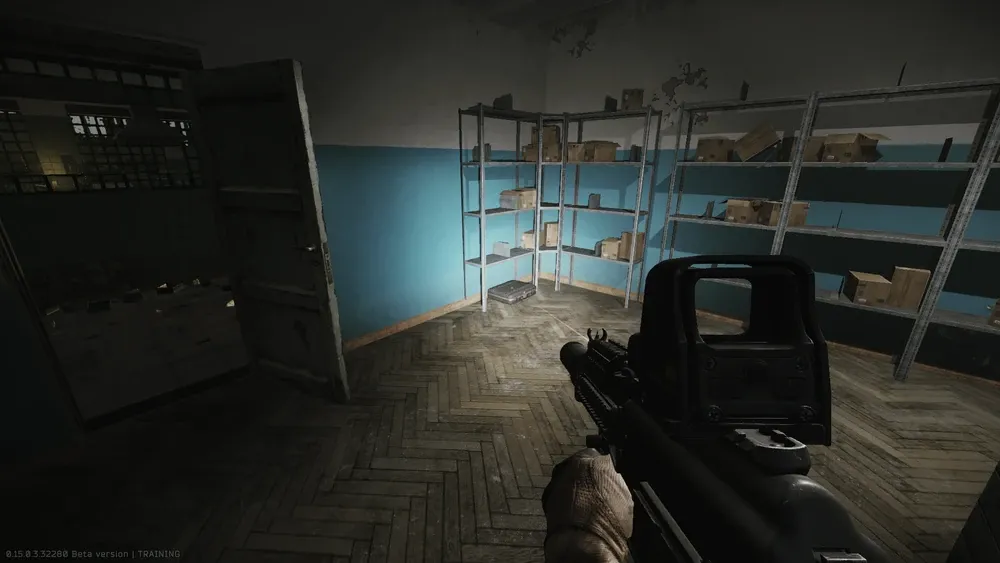 1: In the storage room, on the floor to the left after entering