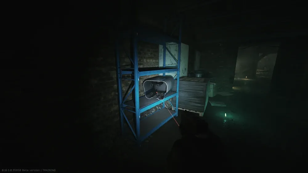 3: In the missile shroud on the blue shelf next to the whiteboard