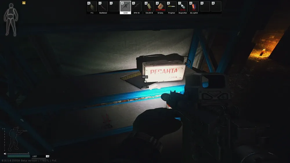 5: Under the welding machine on the center blue shelf