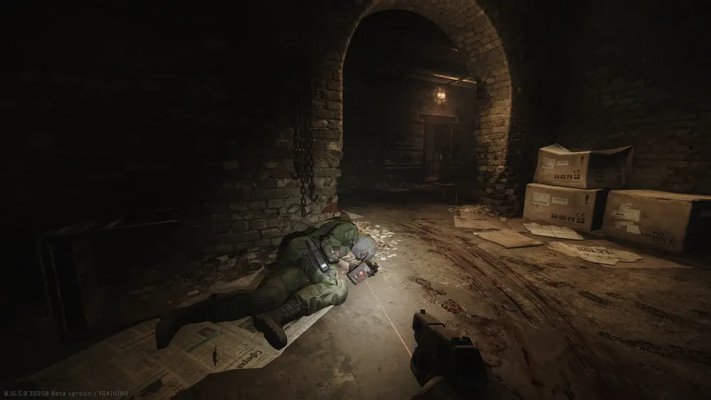 Spawn 3: In the hand of a dead Scav on the ground under the arch opposite the room