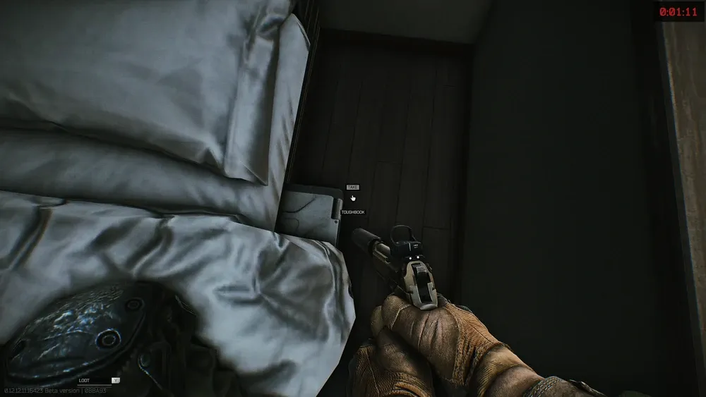 The briefcase is located underneath the bed on the window side
