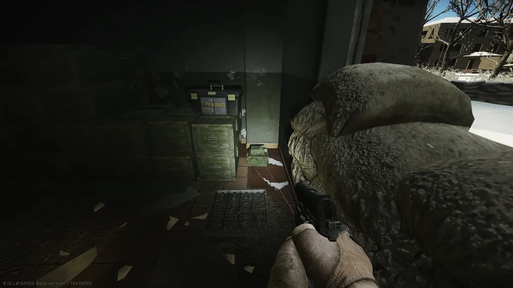 Spawn 1 in the back left corner behind the green crates